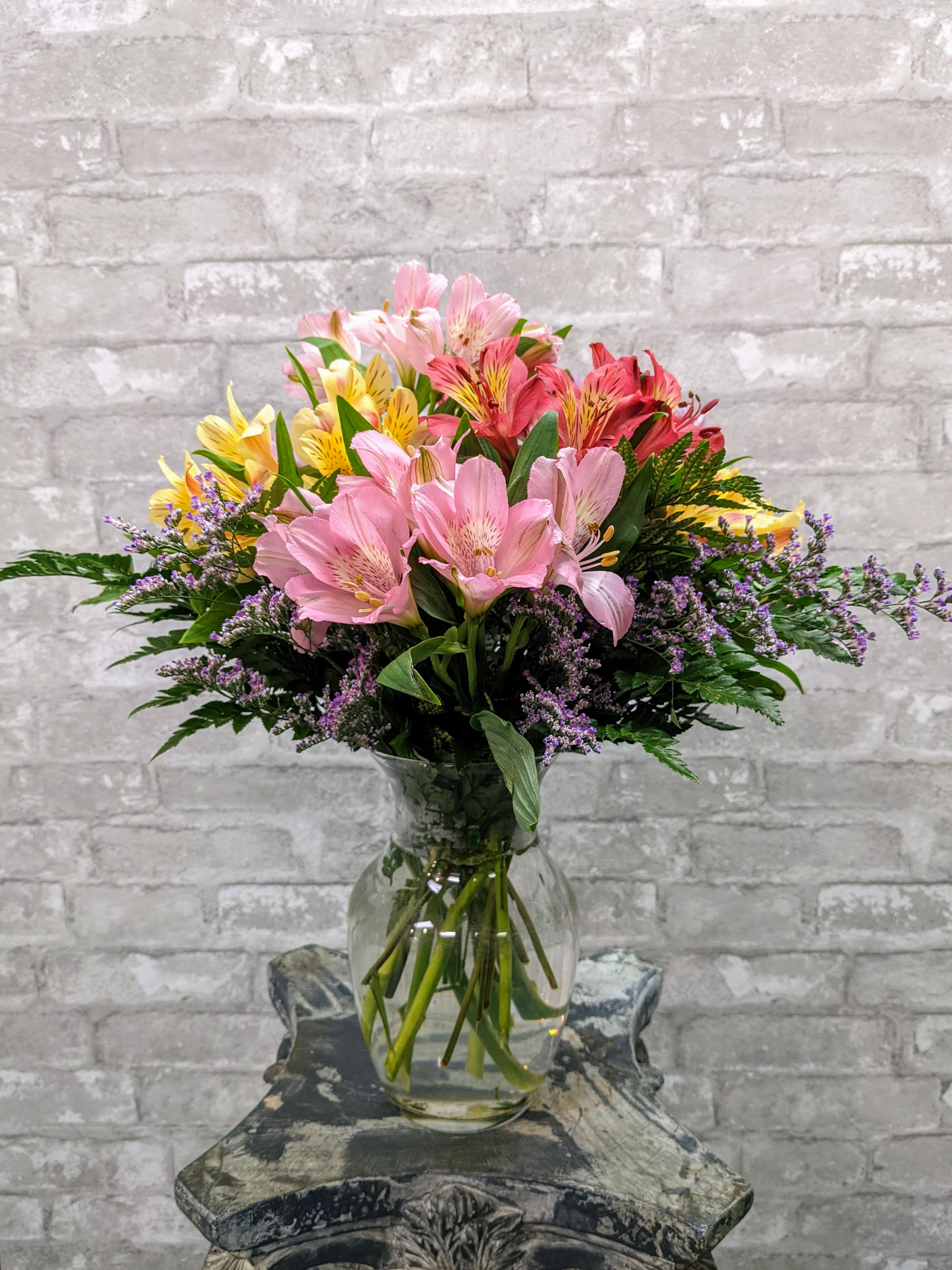 Oh So Lovely FG207M - This pretty arrangement is made with long lasting alstroemeria.  Mixed colors   Approximately 12"H and 10"W.