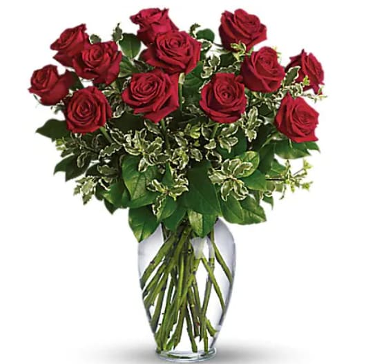 Bouquet of red roses in a clear glass vase