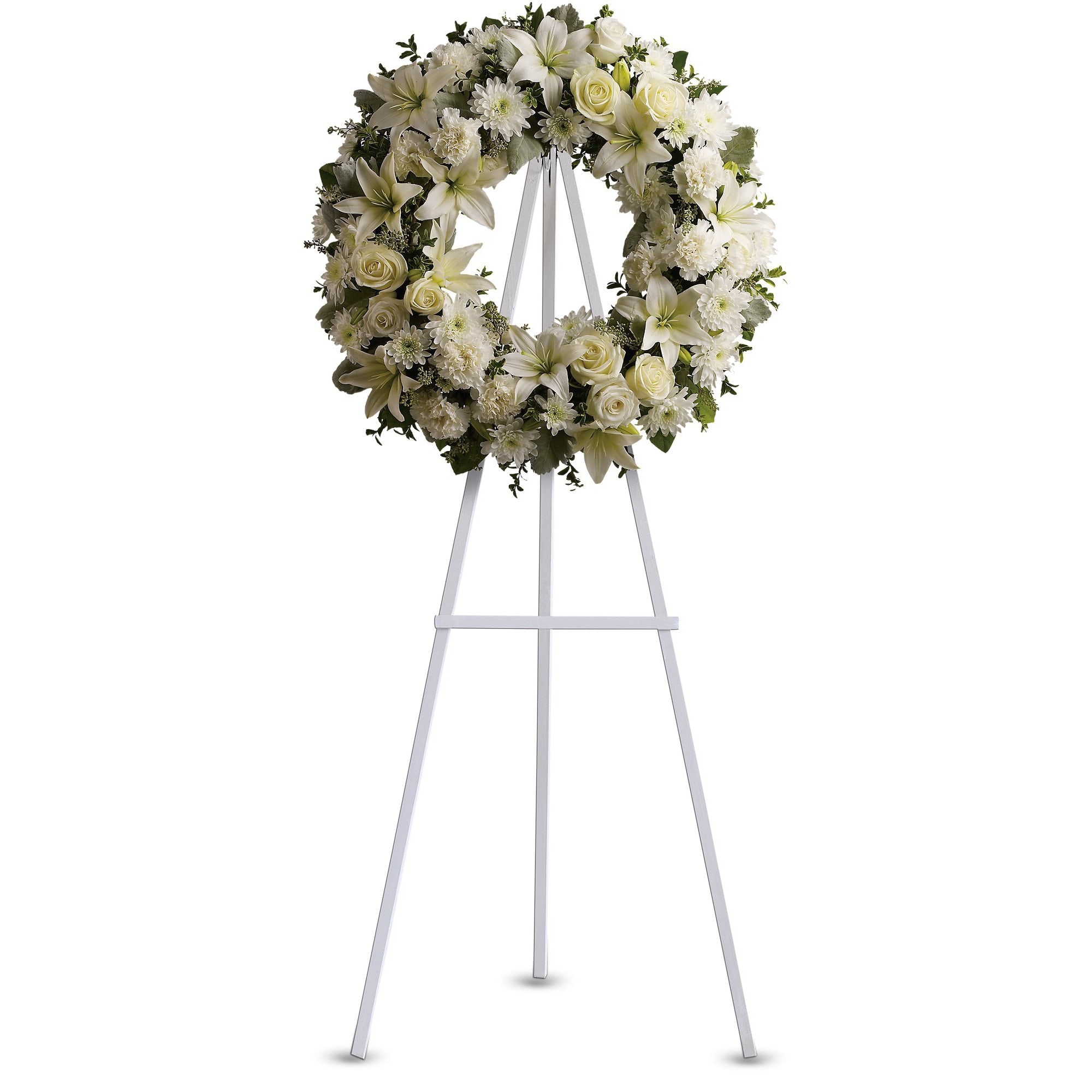 Serenity Wreath  - A ring of fragrant, bright white blossoms will create a serene display at any funeral or wake. This classic wreath is delivered on an easel, and is a thoughtful expression of sympathy and admiration. 