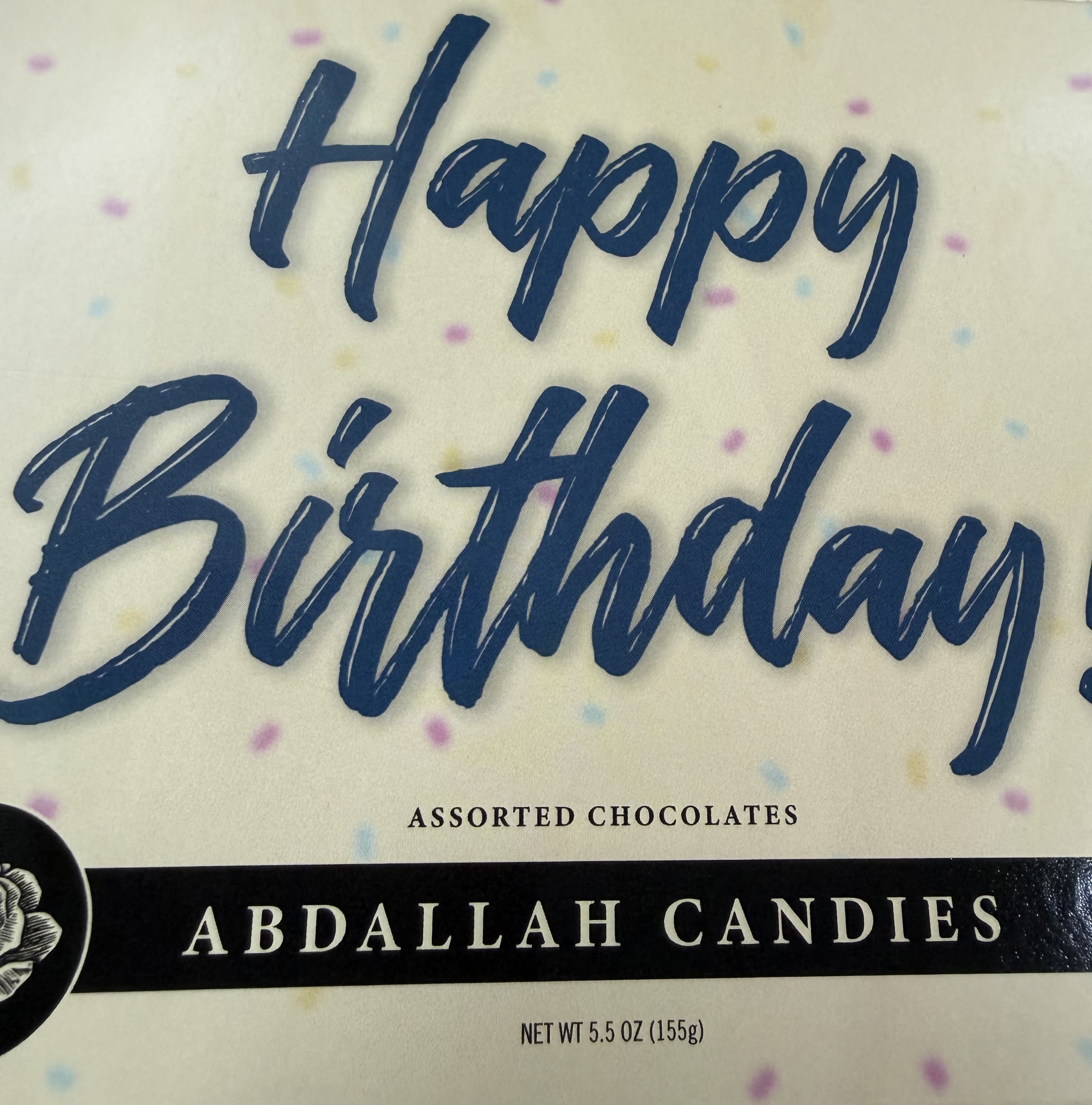 Abdallah Happy Birthday Chocolates - 5.5 oz of Abdallah Chocolates featuring an assortment of sea salt caramels, raspberry creams, pecan caramels, double dark fudge, and butter almond toffee