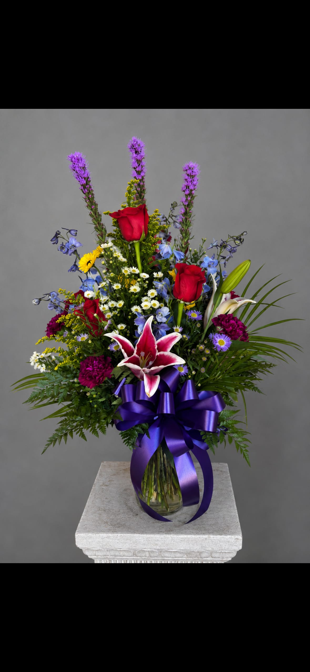 Red Rose mix  - Red rose mixed flower arrangement may not look exactly like photo may have to substitute some of the mix flowers but you will get a pretty arrangement with red roses for this price 