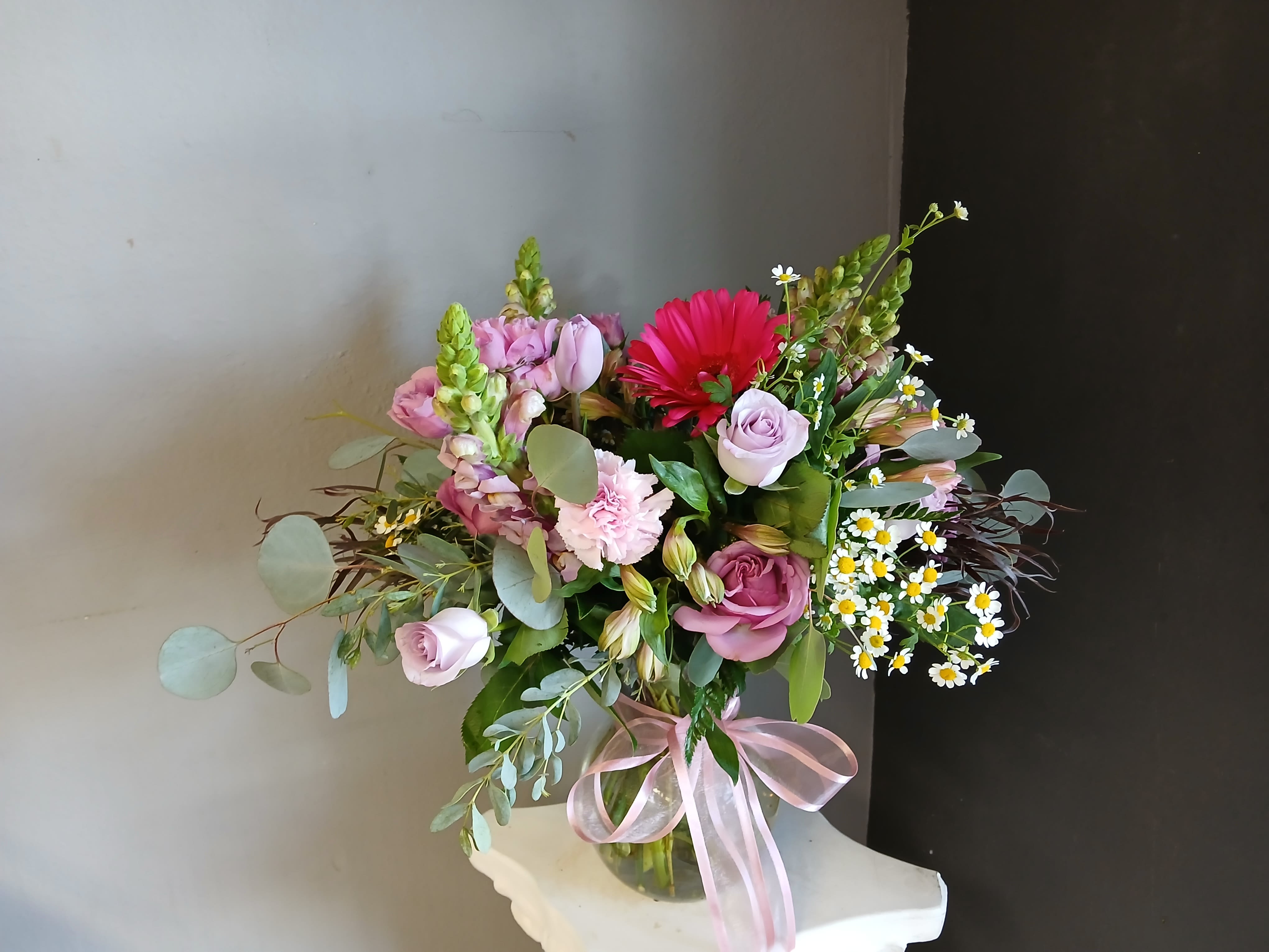 #720 Designer's Choice Vase Arrangement - This beautiful flower arrangement of fresh mixed seasonal blooms is made by local designers in the heart of Orange California. Hand crafted and perfect for every occasion, from birthdays and new babies to sympathy and just because. The best choice to show you are thinking of that special someone. Can be sent as a local delivery or in-store pickup. This is an original, one of a kind arrangement. Order now before it's too late!  UPGRADES: All upgrades are applied at the designer’s discretion and fulfilled to value using the freshest seasonal and/or premium flowers available. Container upgrades may be included when possible; otherwise, value is reflected in the floral selection while maintaining the original design style. 