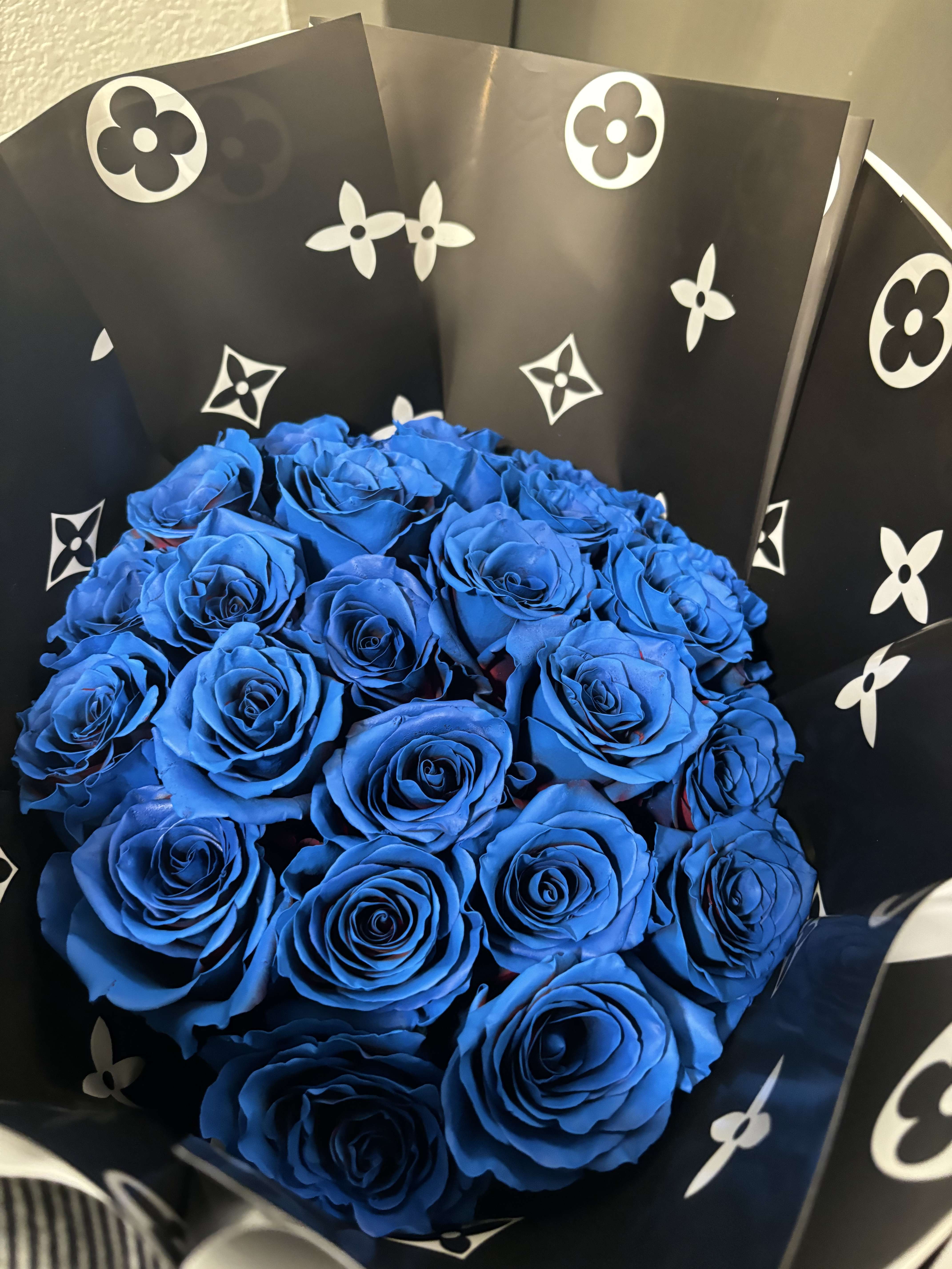 Azure Bliss - Dive into elegance with our Azure Bliss Bouquet, a captivating blend of serene blue blooms that bring modern sophistication to any setting. Perfect for adding a touch of cool tranquility and style to your space or as a chic gift for any occasion. 