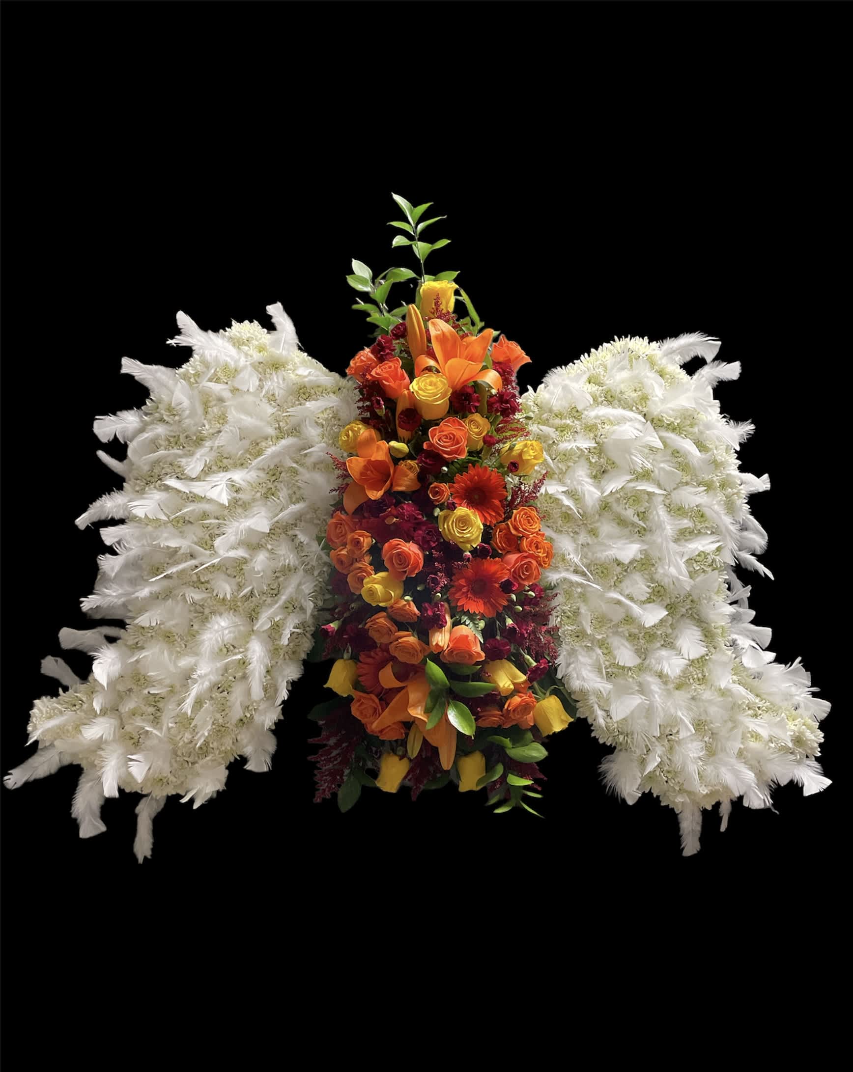 Wings tribute  - In loving memory, our Angel Wings Tribute is a beautiful expression of sympathy.