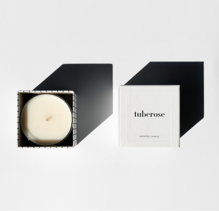 Tuberose scented candle in a square box with a lid