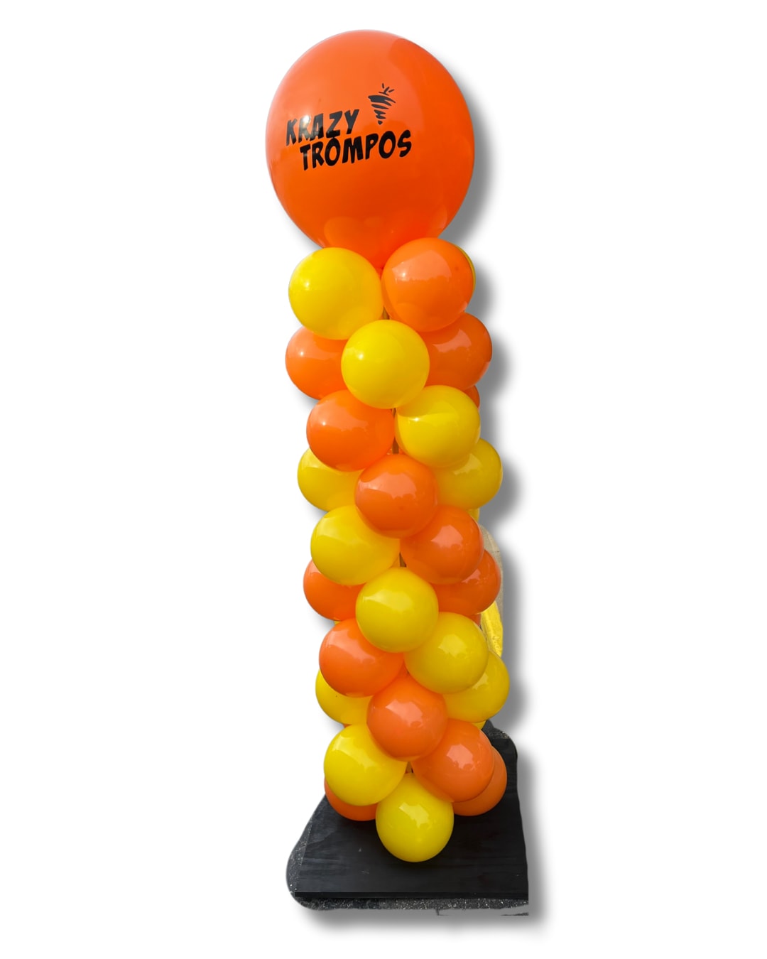 Orange and yellow balloon column on a black base