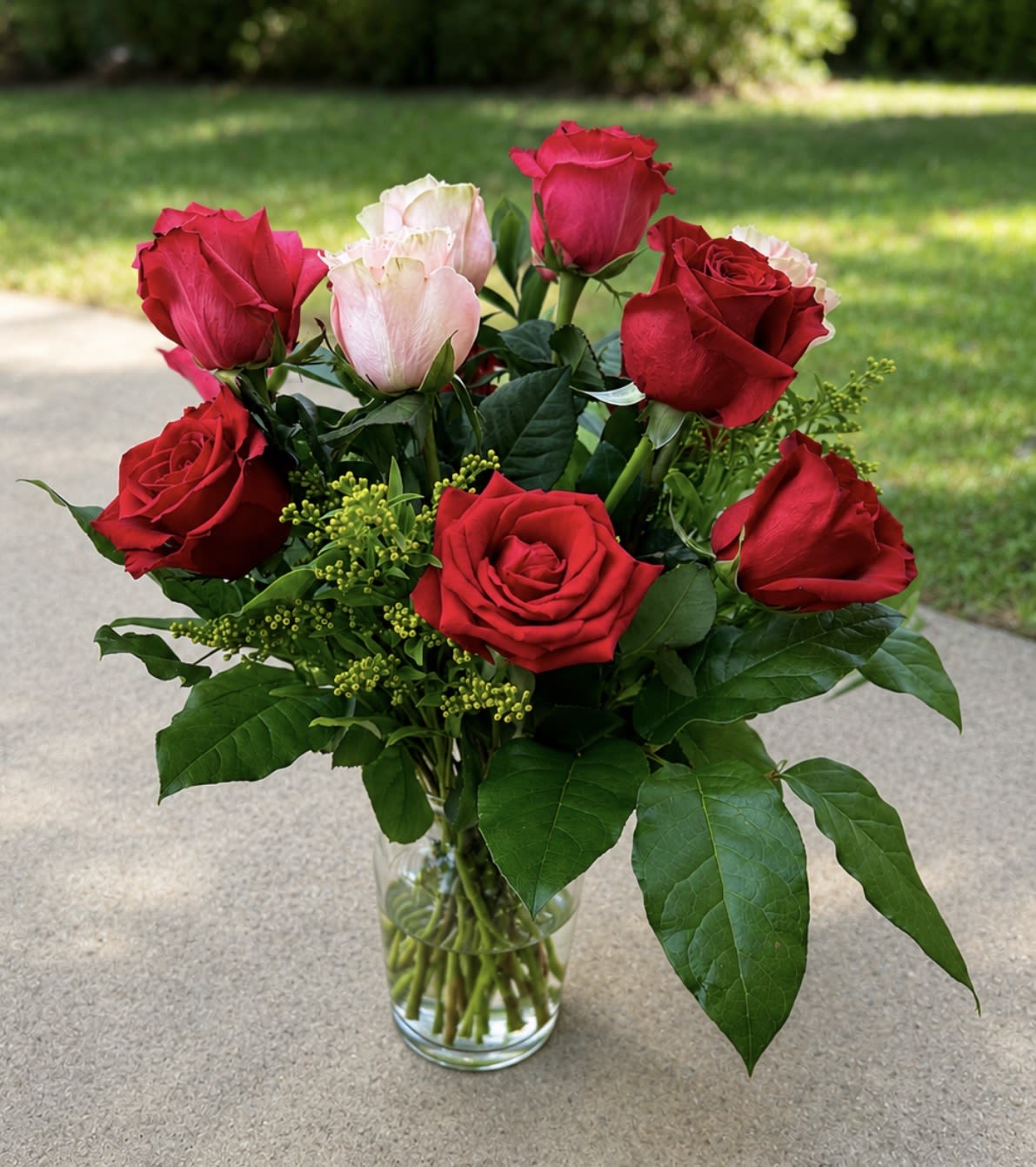 Sweet Romance Rose Bouquet - Express your love and appreciation with our Sweet Romance Rose Bouquet. This elegant arrangement features vibrant red roses paired with soft blush roses, accented with fresh greenery and arranged in a classic clear glass vase. The timeless color combination creates a sophisticated and romantic design suitable for anniversaries, birthdays, thank-you gifts, or any special occasion.  Handcrafted by AZ Flowers &amp; Gifts, each bouquet is designed with care using fresh flowers to ensure lasting beauty and enjoyment. Available for local delivery in Alpharetta, Johns Creek, and surrounding areas.