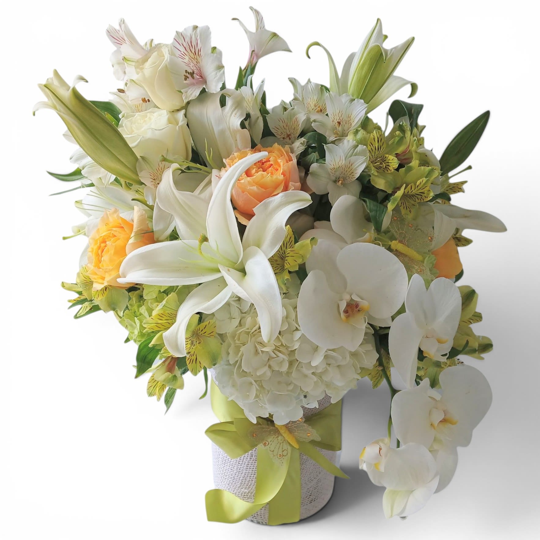 Sympathy Blanca Bouquet Designer's Choice - Intended for the home only. Roses orchids hydrangeas and more arranged in a tall modern glass cylinder vase wrapped in pretty vanilla jute ribbon. Perfect to send to the service or the home to show them how much you care. All of my bouquets are always made extra special and unique each and every time. Send them your deepest condolences. Send them beautiful.