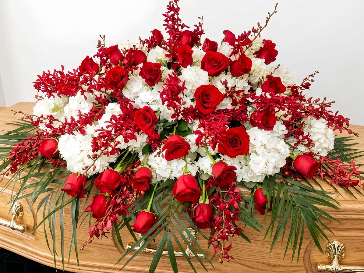 Casket Cover 1 - a casket cover mixed with red flowers