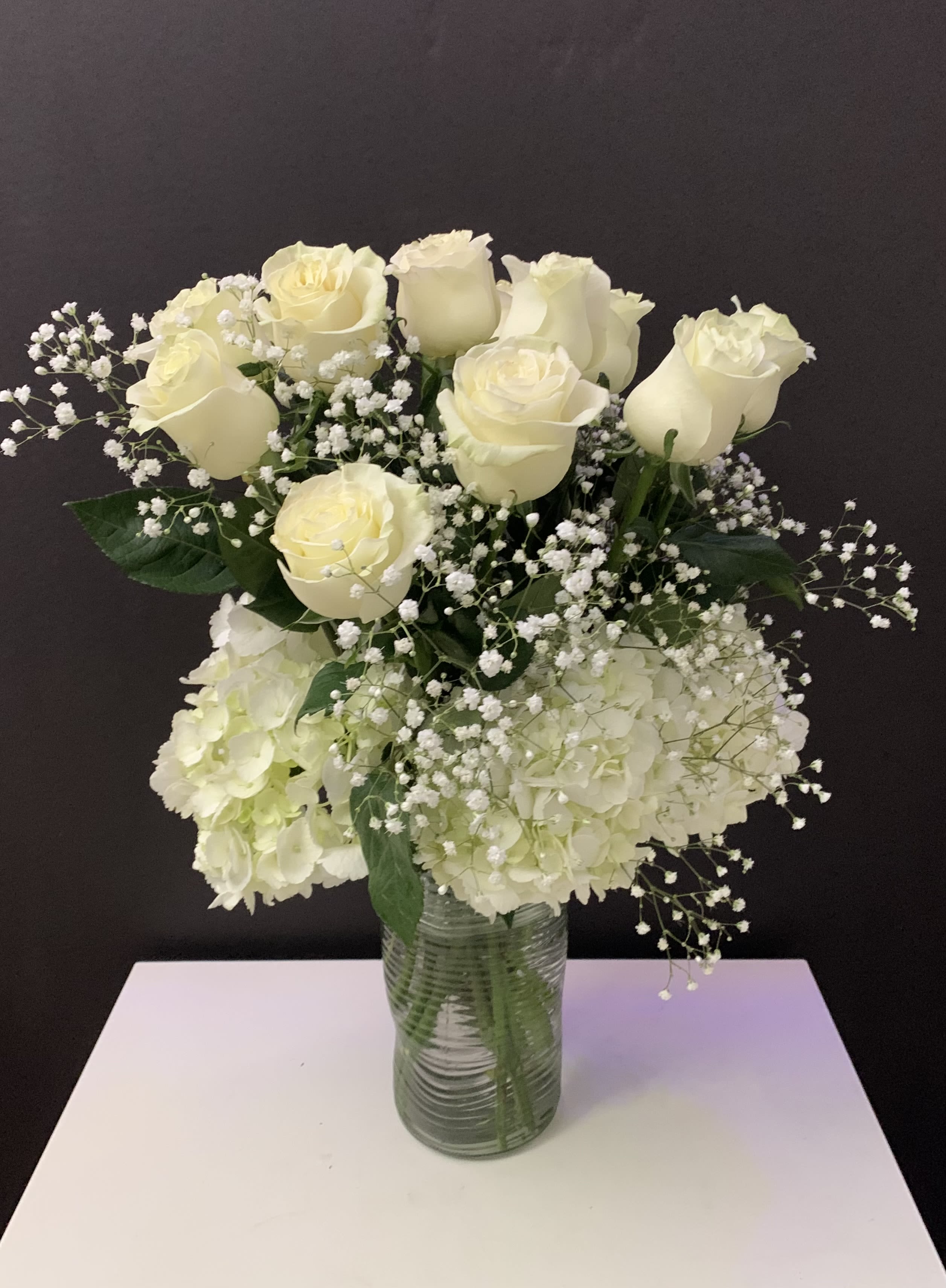 Dozen Whites - White Roses, Hydrangeas in a glass vase 