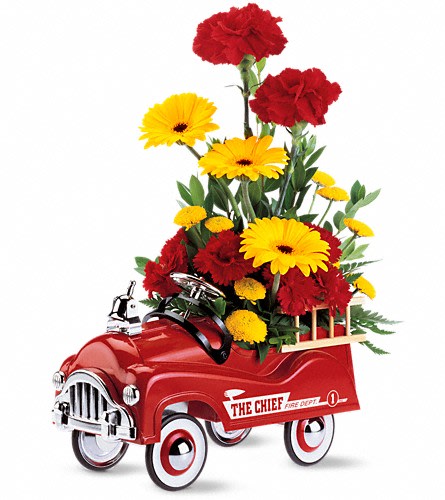 Red toy truck filled with red and yellow flowers