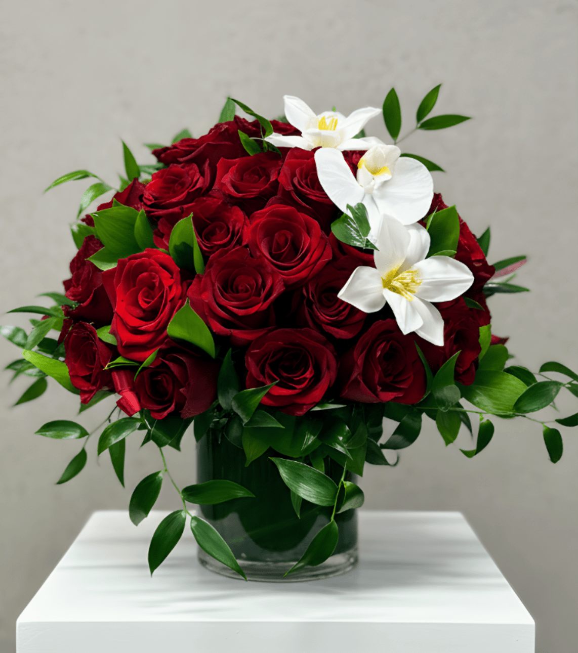 Rouge Éternel Grand Dome - An ultra-luxury floral creation featuring an abundant number of premium red roses, expertly arranged in a full mushroom-style dome. This grand arrangement is designed for maximum impact, with flawless symmetry, rich texture, and exceptional volume.