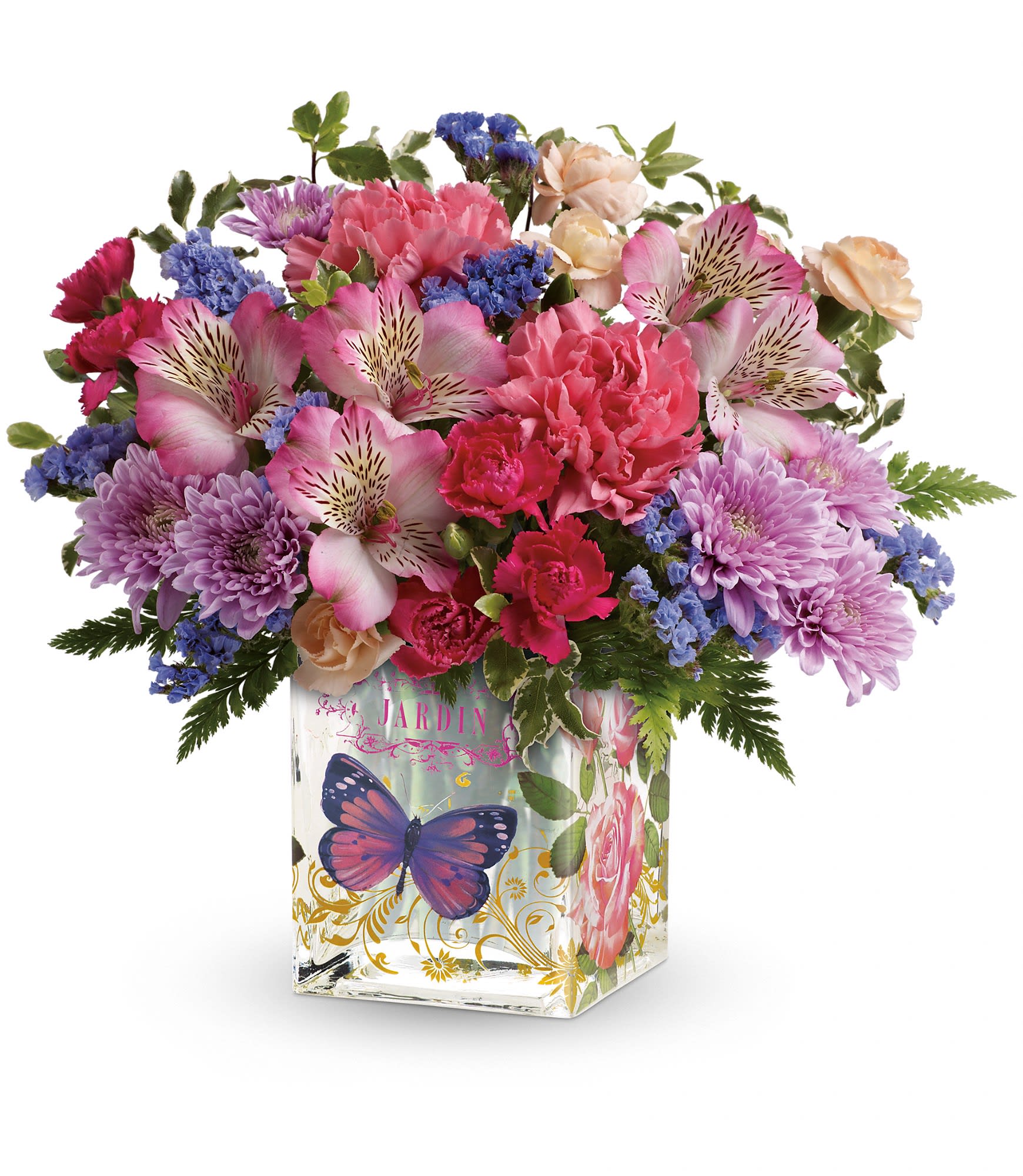 Mixed pink, purple, and blue flowers in a decorated glass vase
