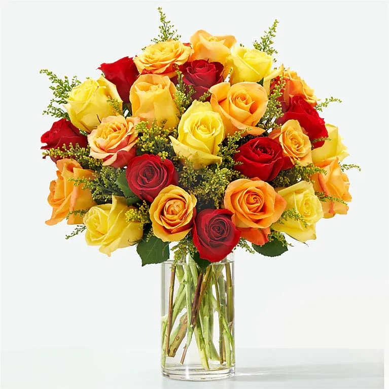 Sunlit Fall Rose - Turn up the heat with this bouquet's stunning roses in fiery shades. 24 roses