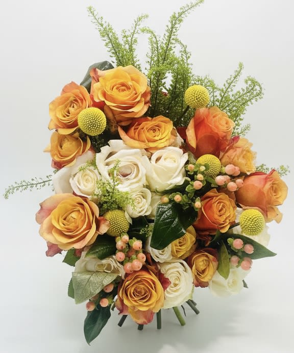 Green Dragon Garden Mix  - A lively blend of orange and white roses gives this flower arrangement an uplifting, spring-fresh presence that makes a joyful birthday bouquet, a warm thank-you, or a thoughtful Father's Day surprise. The Green Dragon Garden Mix reads as an everyday celebration-cheerful enough for congratulations, gentle enough for get well wishes, and quietly romantic for anniversaries or "just because" moments-so the person you're thinking of will feel genuinely seen and lifted.  Tightly hand-tied for a rounded silhouette, the design pairs classic roses with small yellow button blooms and clusters of pink berries for playful texture, while airy green filler adds height and movement. The palette of green, yellow, white, pink, and orange creates a sunny, slightly romantic mood that works well for spring and year-round gifting. Ideal for saying thanks, I'm sorry, or simply thinking of you, this arrangement is a bright, versatile way to mark Mother's Day, graduations, or everyday milestones.  Care is simple: keep stems trimmed, fresh water daily, and the bouquet in a cool spot away from direct sun to prolong bloom life. Choose your preferred size at checkout to match the occasion - from a sweet gesture to a more generous display - and we'll style it to highlight the bouquet's lively textures and colors.