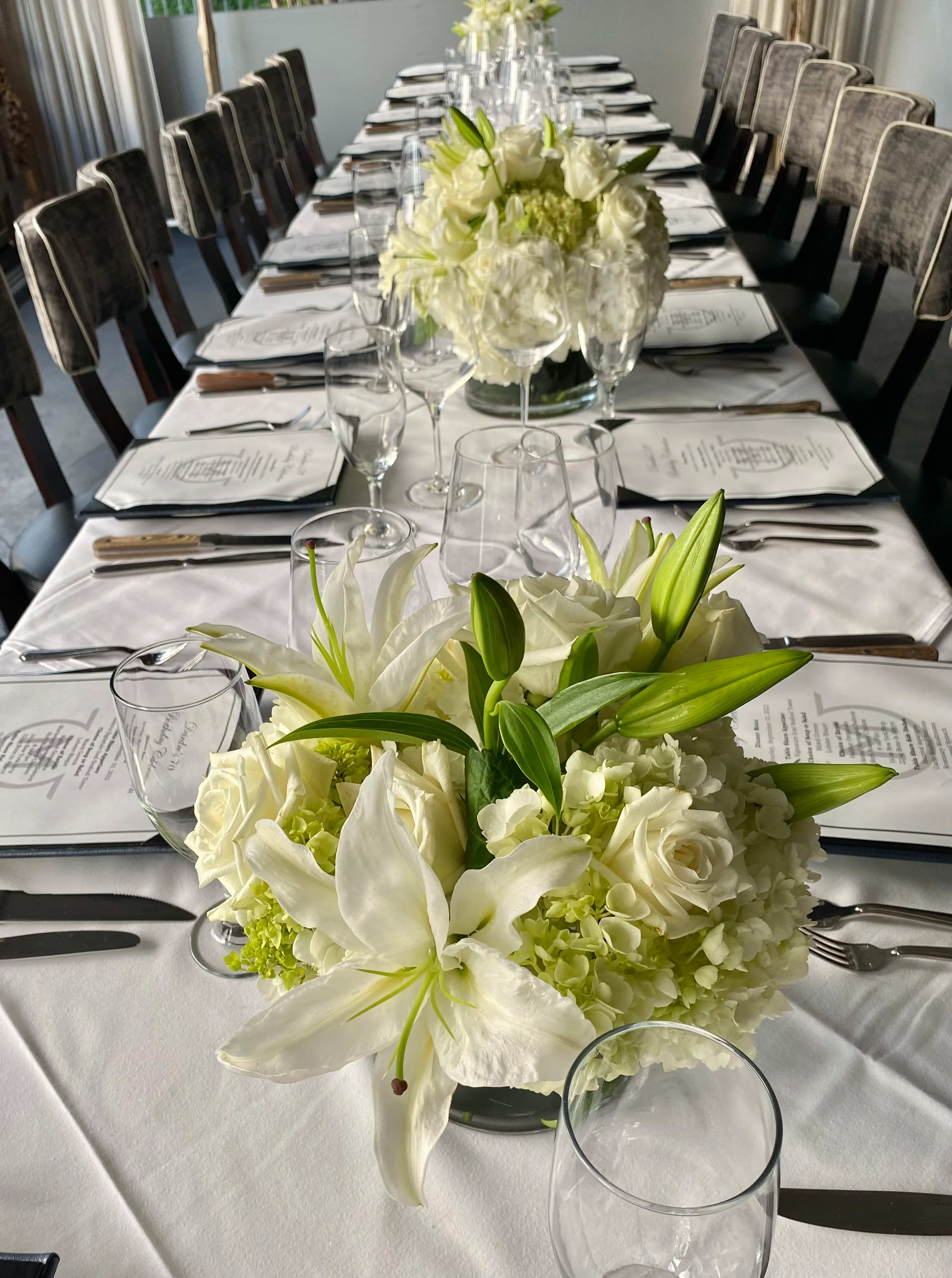 White centrepiece for Mastsos Ocean Club Party  - Lilies, Hydrangeas , Roses 