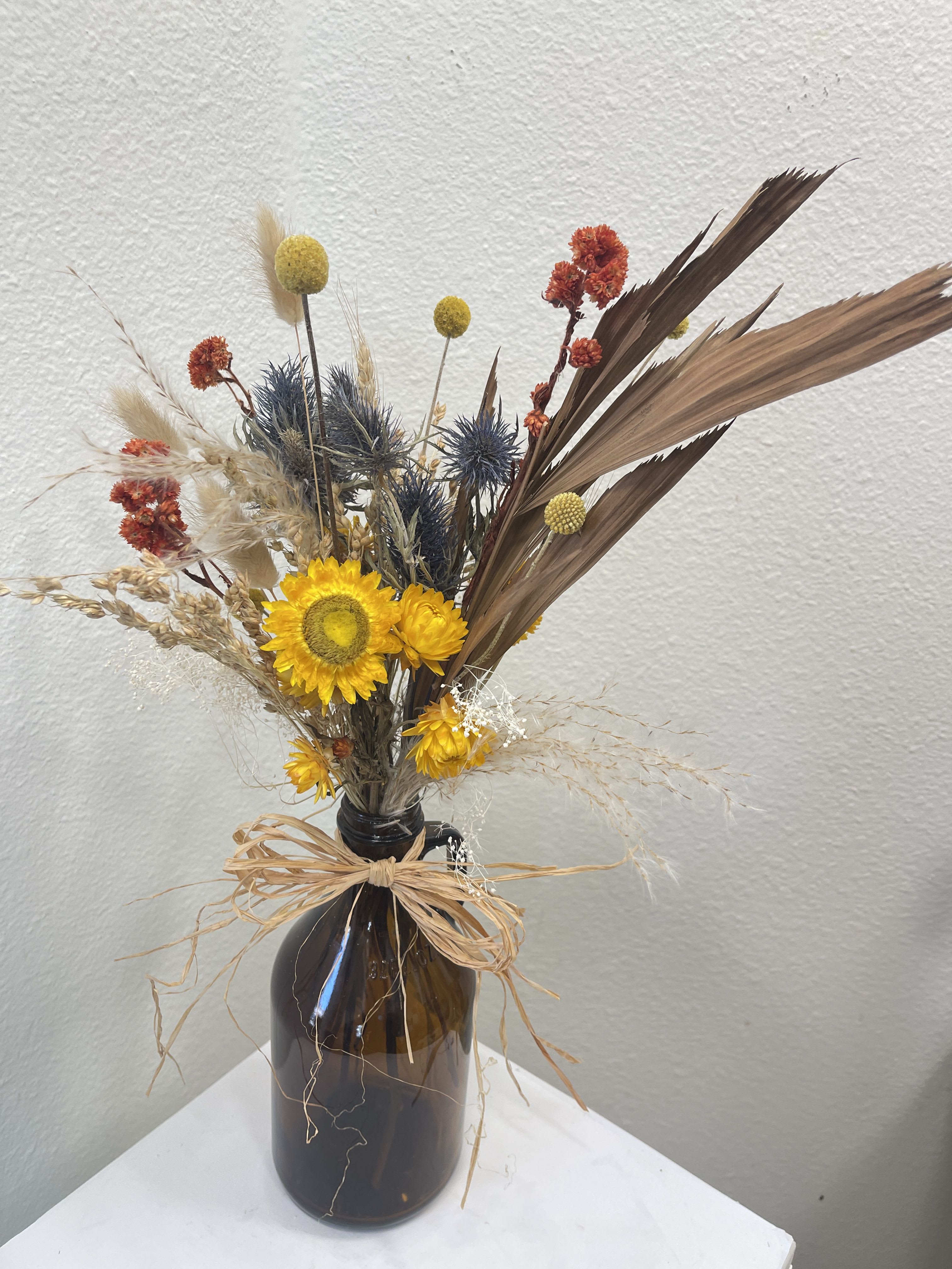 Growler Flowers - Dried Flowers in a Beer Growler.