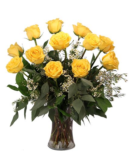 Dozen Yellow Roses Flower Arrangement - These roses will light up any room! Our Dozen Yellow Roses arrangement is bursting with light, love, and sunshine. Inspiring and majestic, everyone who sees this sunny bouquet will feel brighter and sunny. It's sure to bring a smile to anyone's face! Deluxe = 18 Roses Premium = 24 Roses  Includes: Clear Gathering Vase, Greens: Salal, Seeded Eucalyptus, Flowers: Yellow Roses, White Waxflower.