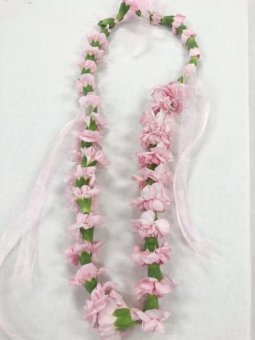 Pink flower lei with sheer ribbon streamers
