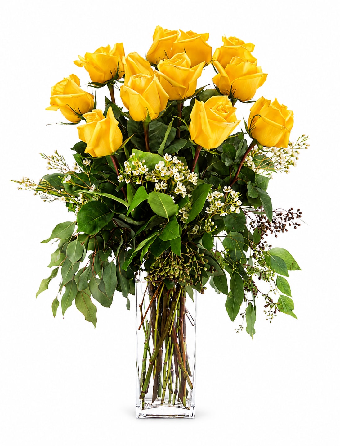 Golden Glow - A tall cluster of bright yellow roses arranged in a clear rectangular glass vase-this Golden Glow flower arrangement delivers sunny, celebratory energy that makes the recipient feel truly seen. Perfect as a birthday bouquet or a graduation gift, the vivid yellow-and-green palette reads joyful and confident without being romantic, so it's ideal for friends, family, or a colleague you want to congratulate.  The arrangement pairs a dozen or so yellow roses with delicate white filler blossoms woven through the center and broad leafy greenery that creates a layered, slightly formal silhouette. Trailing stems soften the rectangular vase and add movement, while the clear glass keeps the focus on the flowers' luminous color and texture. Approximate dimensions: 18" diameter x 25" height.  Send Golden Glow to mark a new milestone, say congrats on a job or graduation, or brighten someone's day just because-she'll feel uplifted and celebrated. Vase-arranged and ready to display; change the water every few days and trim stems for best freshness.