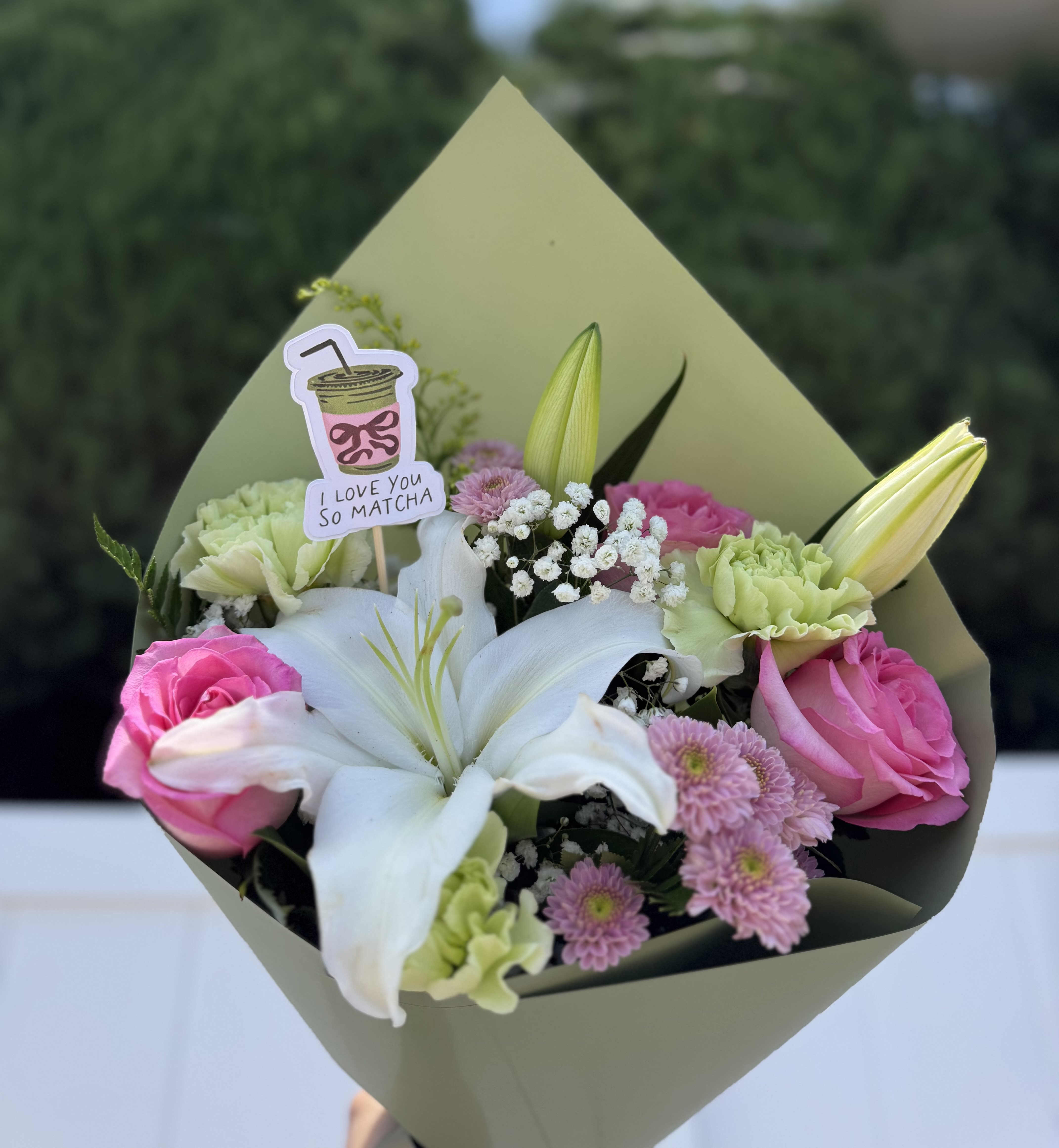 Love You So Matcha - A Mix of pink, green and white blooms, topper included , in a green wax wrap 