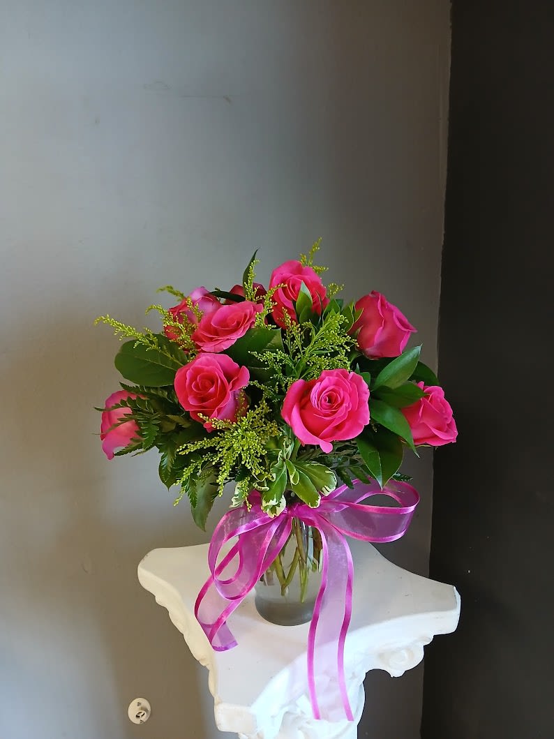 *Elevated* Rose Special In a Vase #2 - This fan favorite rose special includes mixed colored (excluding red) local 40 centimeter local roses in a vase. A beautiful way to let someone know you are thinking of them, perfect for any occasion. The life expectancy of this beautiful arrangement is approximately 3-5 days. May be more or less depending on how they are cared for. 