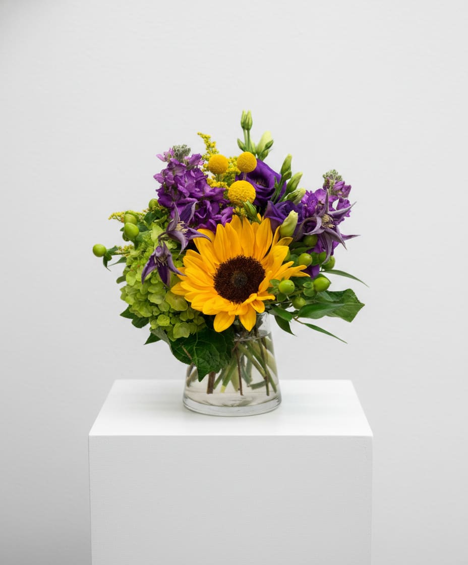 See You Smile - Sunflowers are accented with purple and green blooms