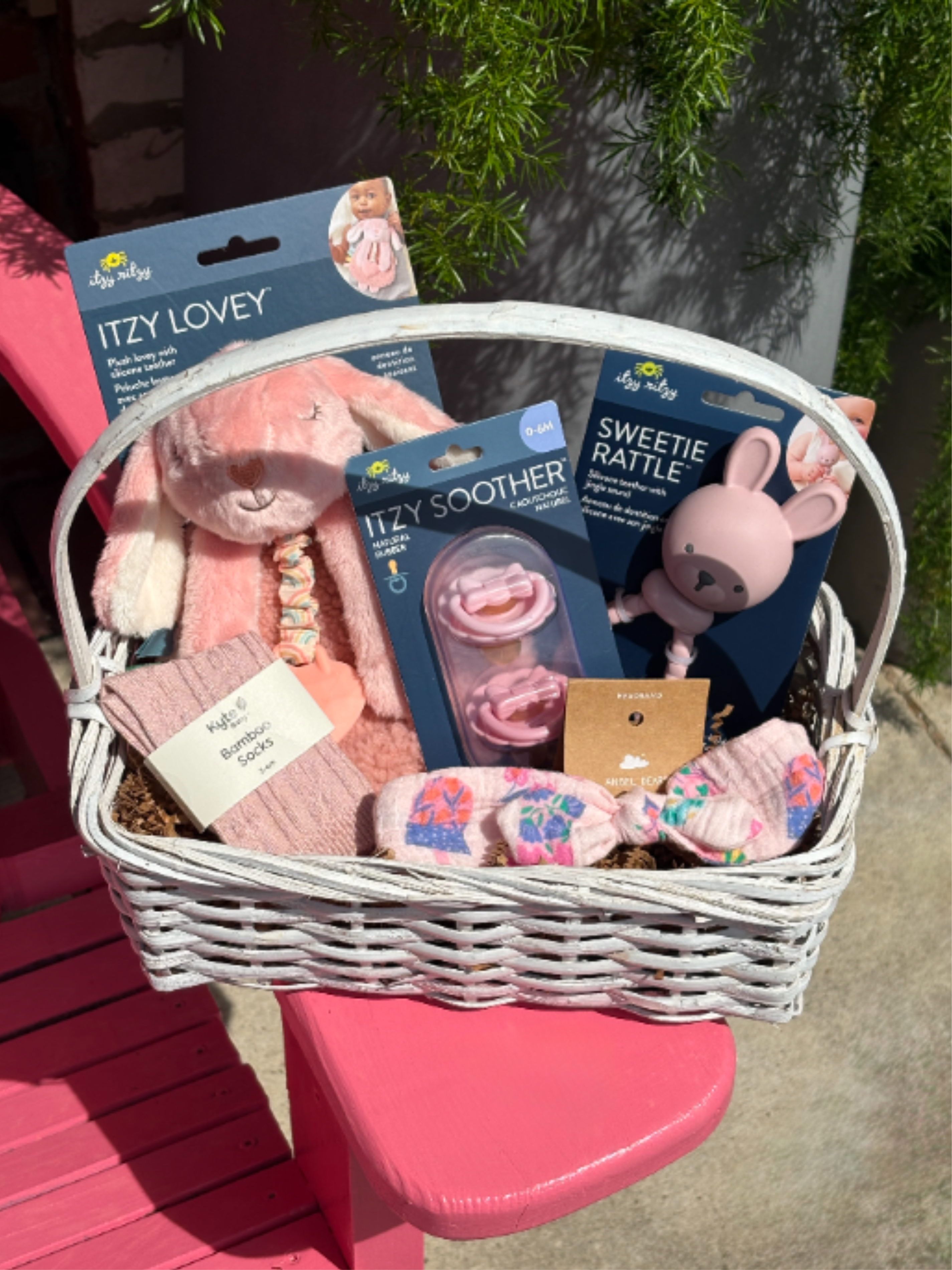 Baby Girl Gift Basket  - Send this sweet little bundle of gifts to the new baby in your life. A stuffed animal, pacifiers, rattle, headbands, and socks. As the price increases, we will upgrade and add more newborn goodies.