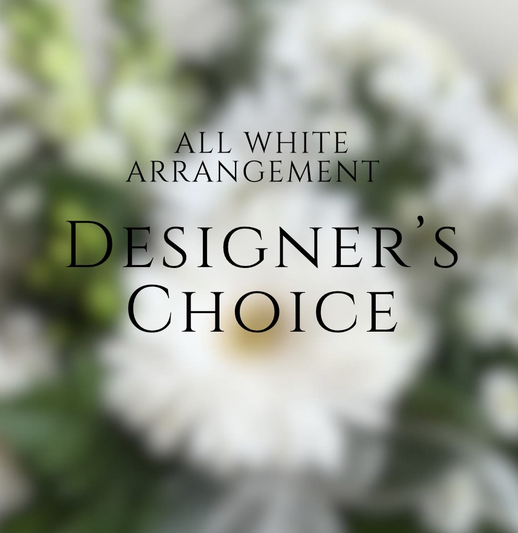ED23 White Arrangement - Our designers will create an all white vase arrangement using an assortment of fresh flowers in white, cream, and green.