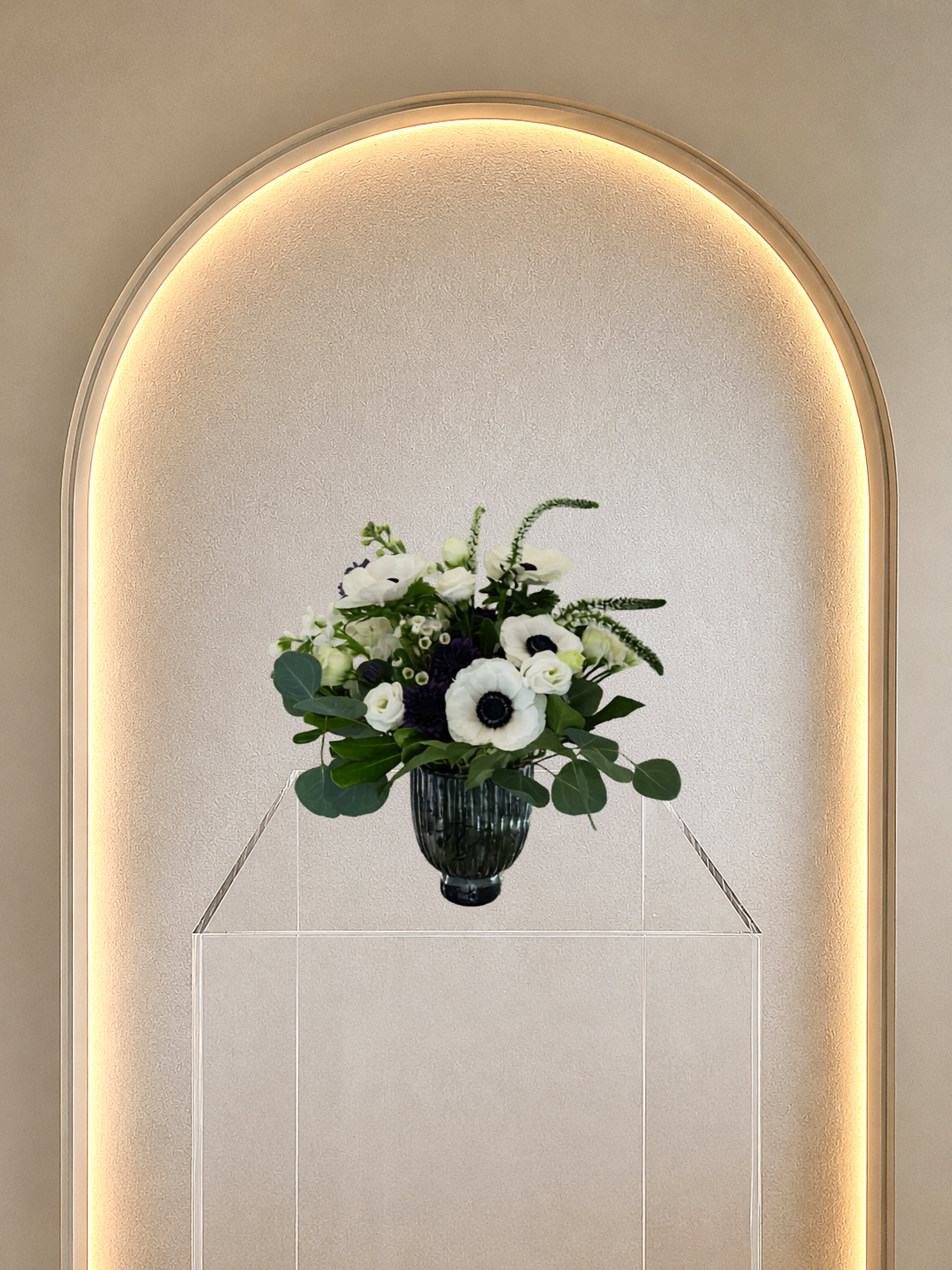 Blue Bloom - A dramatic yet classy arrangement designed in an elegant glass ribbed vase. 