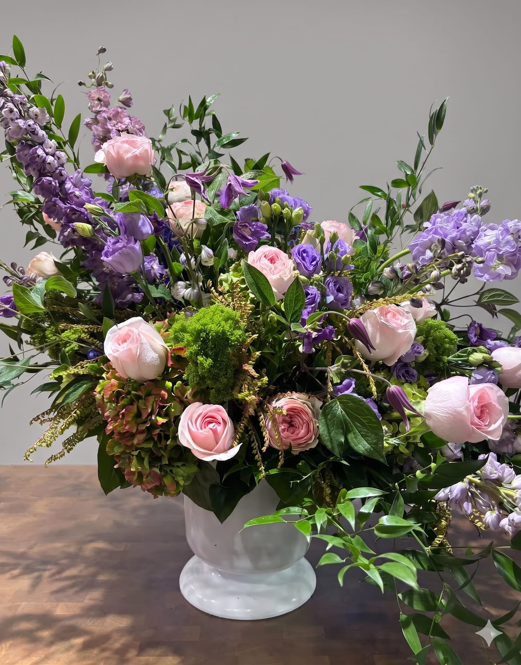 BP79 - Forever in Bloom - An elegant mix of soft roses and seasonal flowers that radiates calm beauty. A versatile choice to brighten any space or occasion.