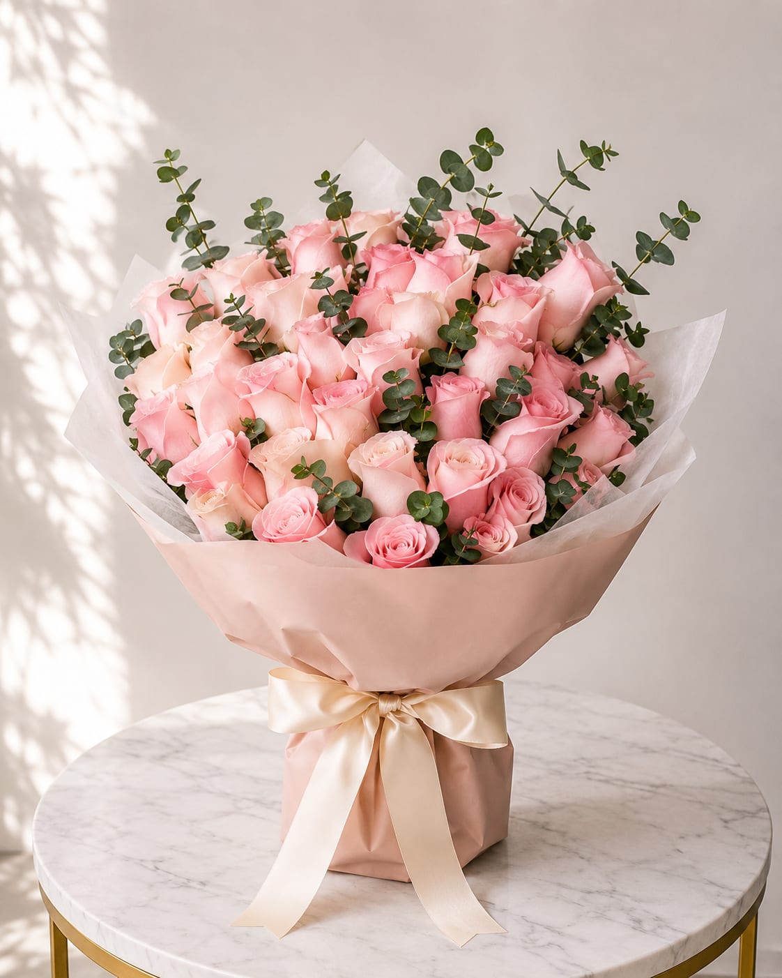     Rosé Bloom - A luxurious bouquet of 36 premium pink roses accented with fresh eucalyptus and elegantly wrapped in signature Korean paper. Designed with soft beauty and timeless elegance, this bouquet is perfect for birthdays, anniversaries, celebrations, and romantic occasions. Available for local flower delivery in Myrtle Beach, South Carolina.