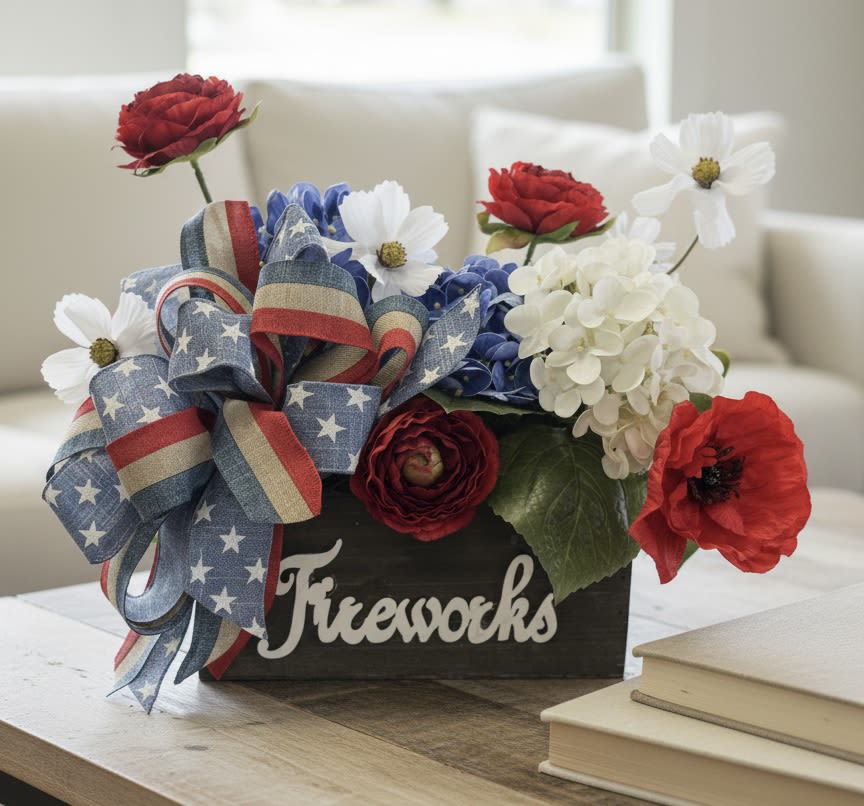 Spirit of 1776 - Honor the birth of a nation with Spirit of 1776, a handcrafted silk floral arrangement designed to celebrate America’s 250th Anniversary. Created with premium, lifelike silk flowers, this keepsake design captures the pride, courage, and enduring spirit that have defined the United States since 1776.