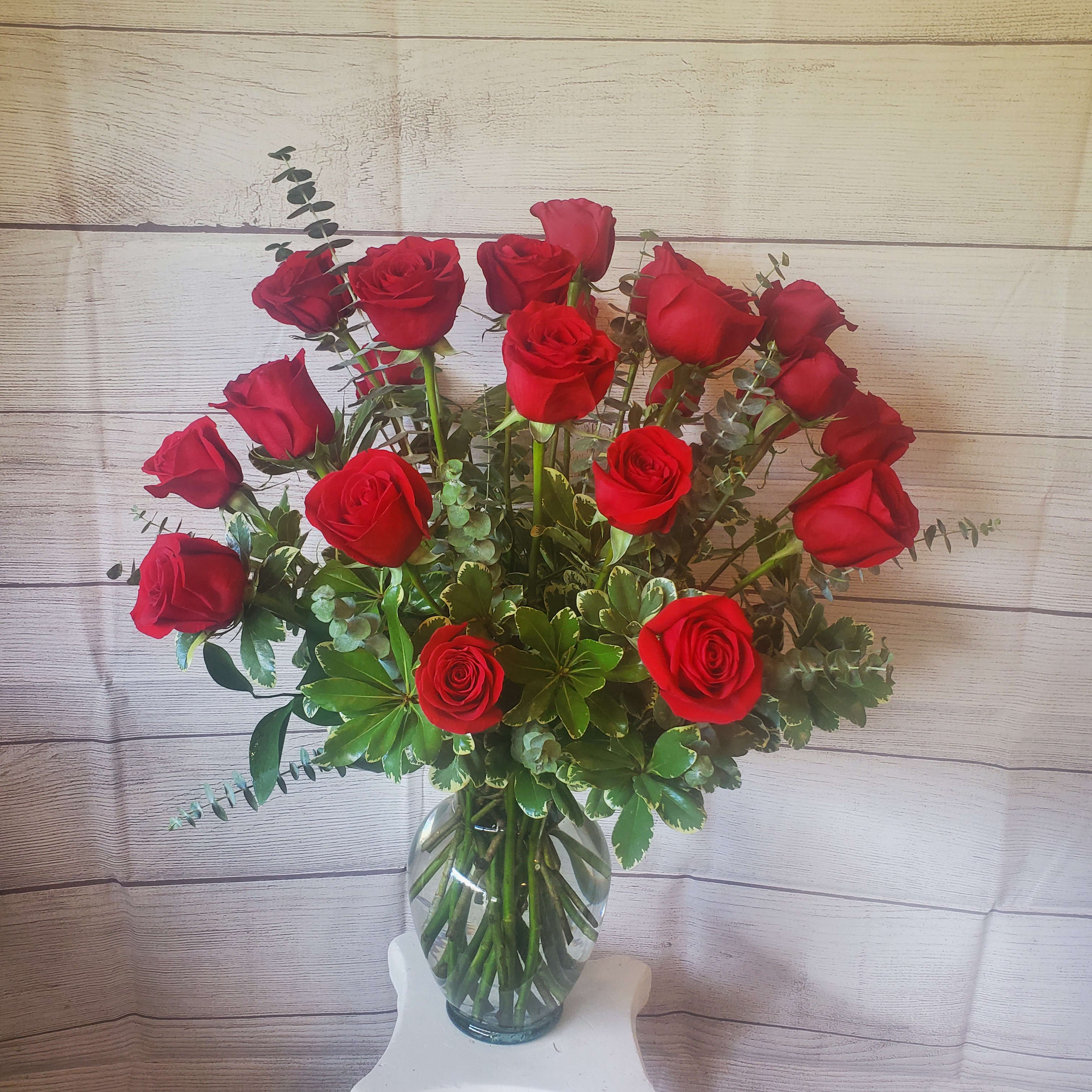 Two Dozen Long Stemmed Roses by BloomNation™ - These two dozen red roses provides the classic romantic gift. It's perfect for Valentine's Day or an Anniversary. APPROXIMATE DIMENSIONS: 30" H X 22" W  24,30 or 36 Roses
