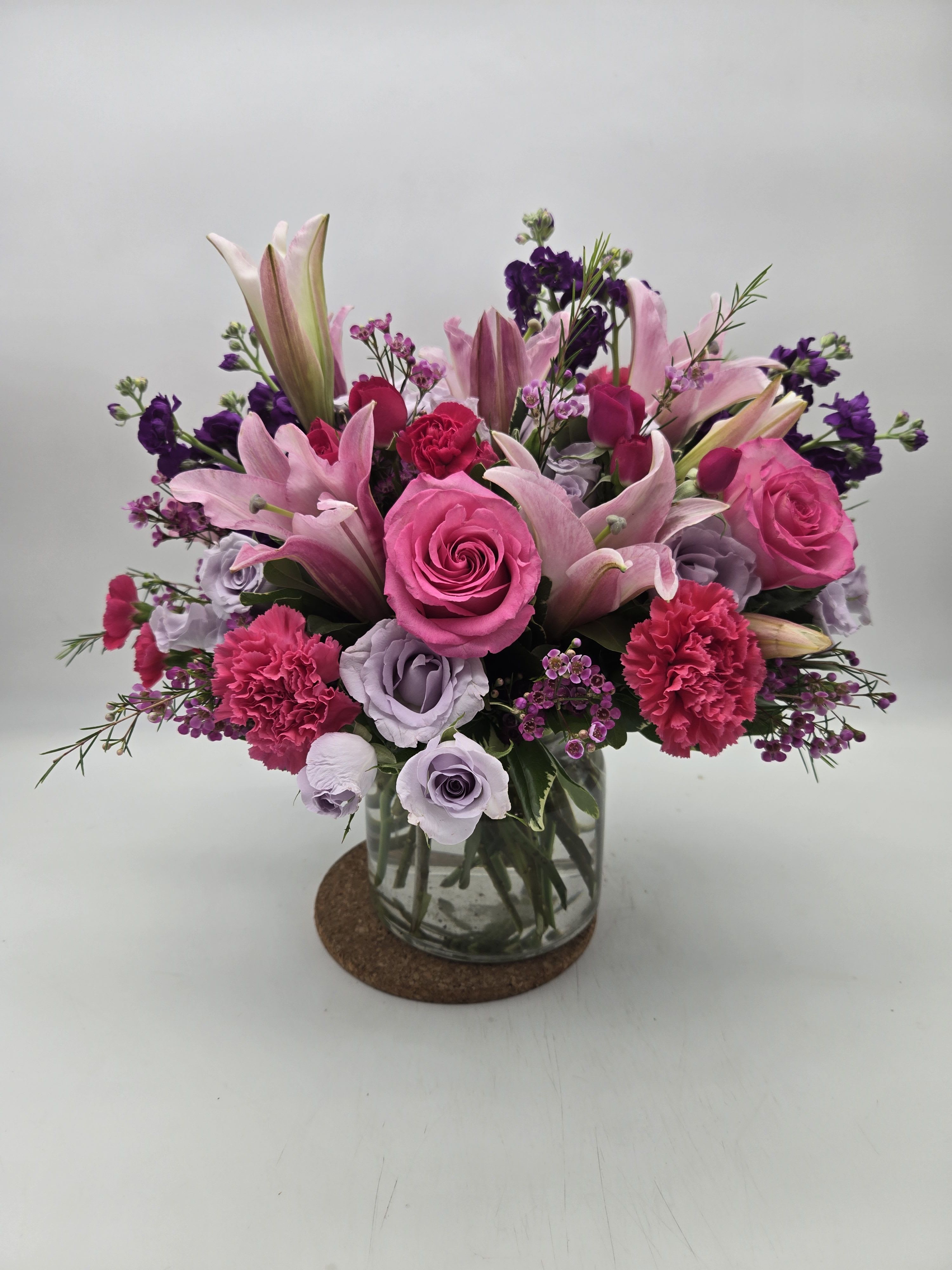 The Sweet Thing  Bouquet  - Love is sweet, love is bright, &amp; love is unique. Remind your Galentine, mom or someone special that you love them with this beautiful bouquet featuring carnations, pompons &amp; more beautiful flowers in a clear glass vase.   Details