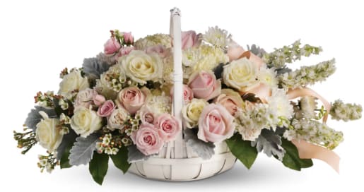 Dawn of Remembrance - To offer comfort and consolation, these serene, softly colored roses and chrysanthemums are nestled in a round white basket with handle. Satin ribbon is threaded throughout to complement the soft look.