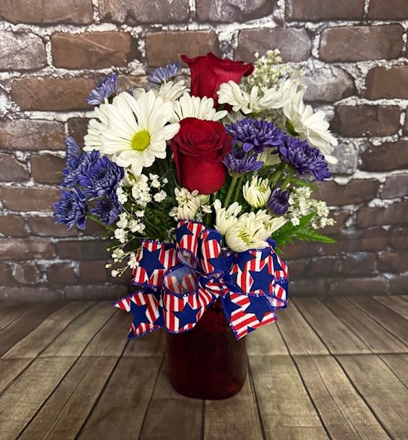 Patriotic Posies - A beautiful red, white and blue arrangement perfect for any celebration. Approx:  15" H x 12" W