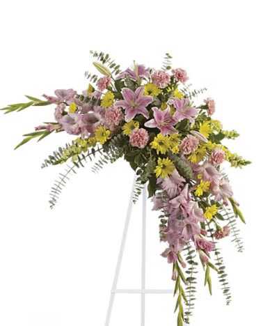 Sweet Solace Spray - Soft, soothing pink lilies and yellow daisies are crafted into a crescent standing spray - what a lovely remembrance of your friendship, and perfect selection for a memorial service.