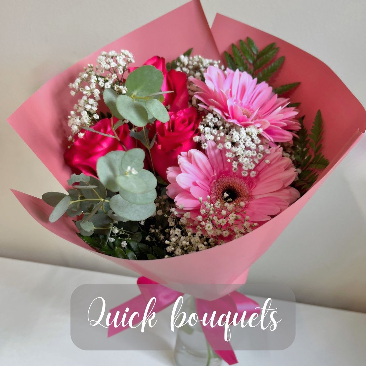 Flower Bouquets - A charming hand-tied floral bouquet in soft, elegant tones, beautifully arranged with lush greenery for a timeless and graceful look. Perfect for brightening someone's day. 