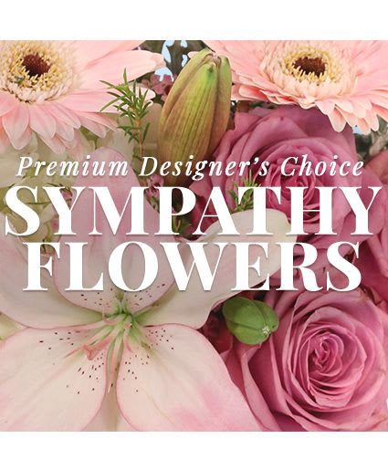 Graceful Sympathy Florals Premium Designer's Choice - Send your love with beautiful flowers that speak more than words. Our expert florists have designed a stunning flower arrangement that is sure to lift their spirits and show them just how much you care. Send our Premium Designer’s Choice Sympathy arrangement to someone who needs it.