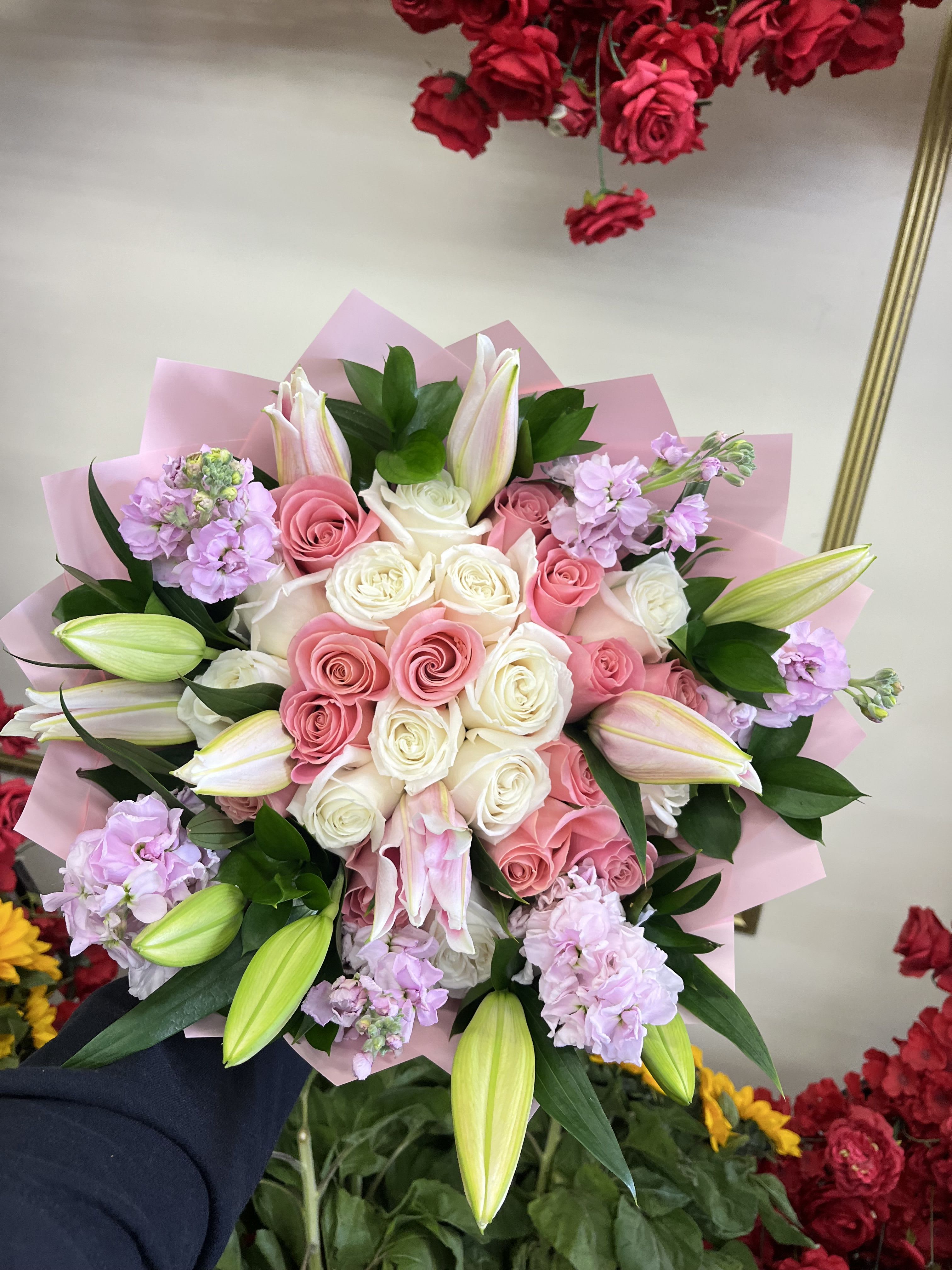 Pink and white rose bouquet with lilies and lavender flowers