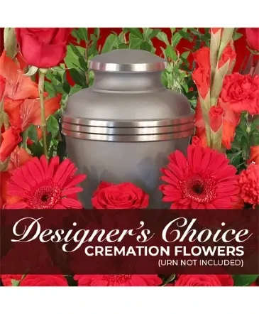 Elegant Memorial Florals Cremation Designer's Choice - Honor your loved one's memory with a beautiful floral arrangement. Our designers will create a stunning display to surround the urn you have chosen for your loved one. Celebrate their spectacular life with flowers that will be ideal for any memorial service. (Urn not included)  *Please note colors and flowers pictured do not reflect the finished product; color and flower selections may vary.  Includes: Designers Choice Arrangement That Surrounds An Urn.