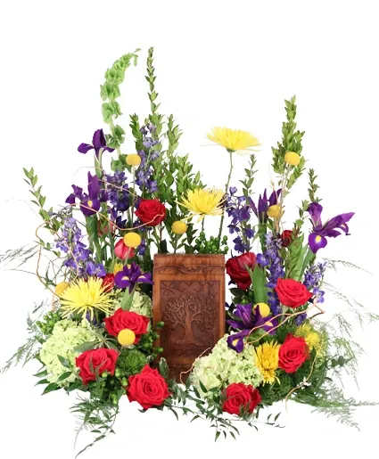 Everlasting Praise Cremation Flowers  - Everlasting Praise stands as a radiant tribute adorned with the timeless elegance of irises, the deep passion of red roses, and the golden glow of yellow spider mums and billy buttons. Red tulips symbolize enduring love, while delphinium adds a touch of majestic beauty. Order this arrangement today to honor a loved one.  Includes: Wreath, Cut Out, Curly Willow, Myrtle, Variegated Pittosporum, Italian Ruscus, Yellow Billy Buttons, Deep Blue Delphinium, Green Tick Dianthus, Green Hydrangeas, Purple Iris, Red Roses, Yellow Spider Mum, Red Tulips.