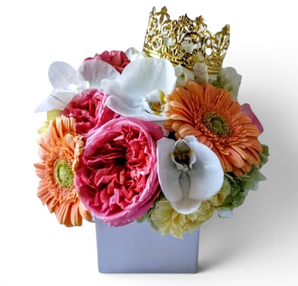 Just Because Cheerful Blossoms Bouquet Designer's Choice - Made unique and different each time from my cheerful blossom selection of that day. Perfect for every occasion. Send this beauty today to show them how much you care with it's colorful mixed blossoms of that day roses orchids and more arranged in a modern glass cube vase adorned with a gold crown. All fresh flower bouquets that leave my studio are beautiful works of art. Send them happiness. Send them a special bouquet to make them smile.