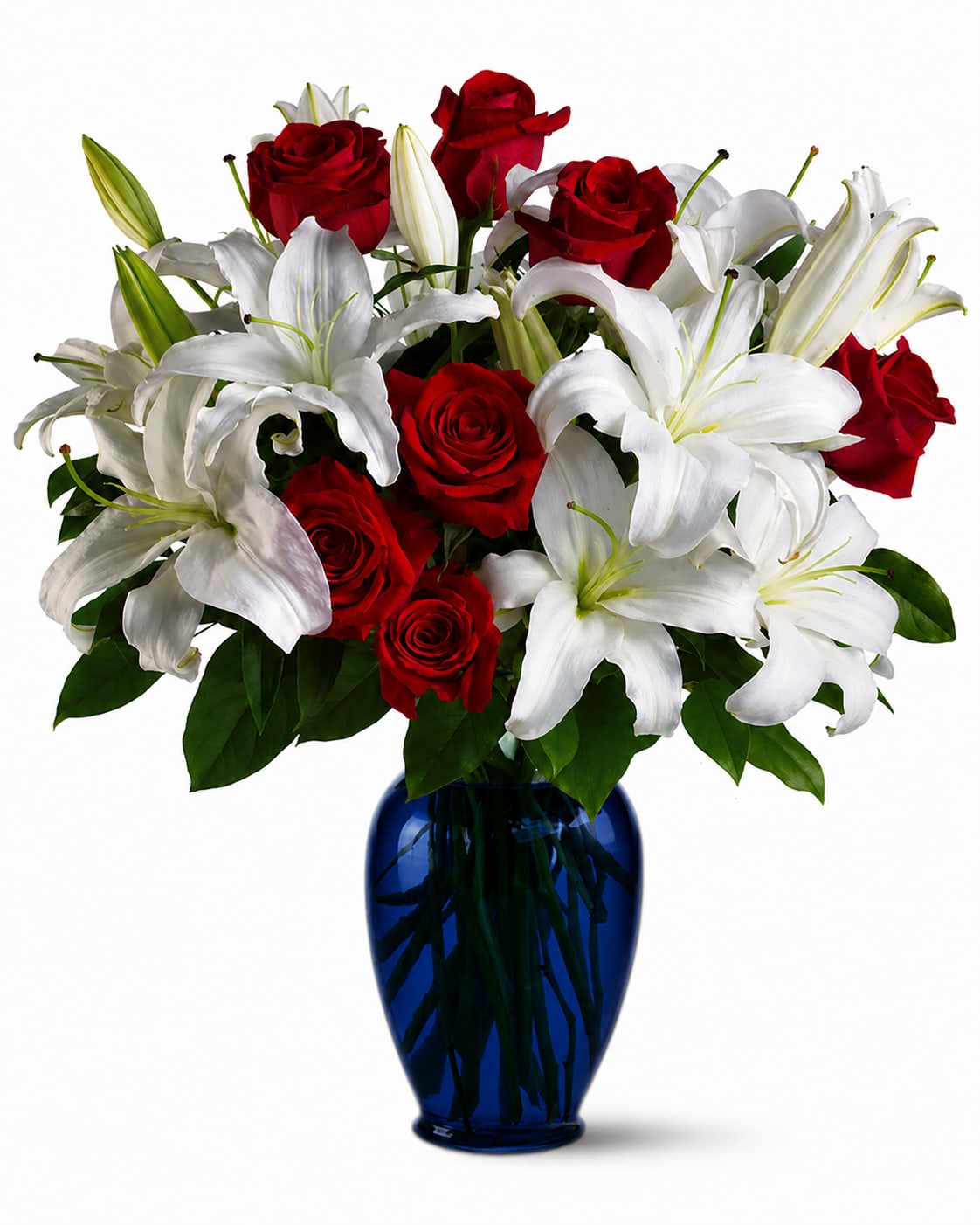 RWB  - A classic red, white and blue floral arrangement that reads as both elegant and celebratory-perfect for patriotic holidays, anniversaries, or a formal gift to show heartfelt appreciation. The combination of red roses and large white lilies creates a romantic, high-contrast look that will make the person you're thinking of feel truly honored and seen.  