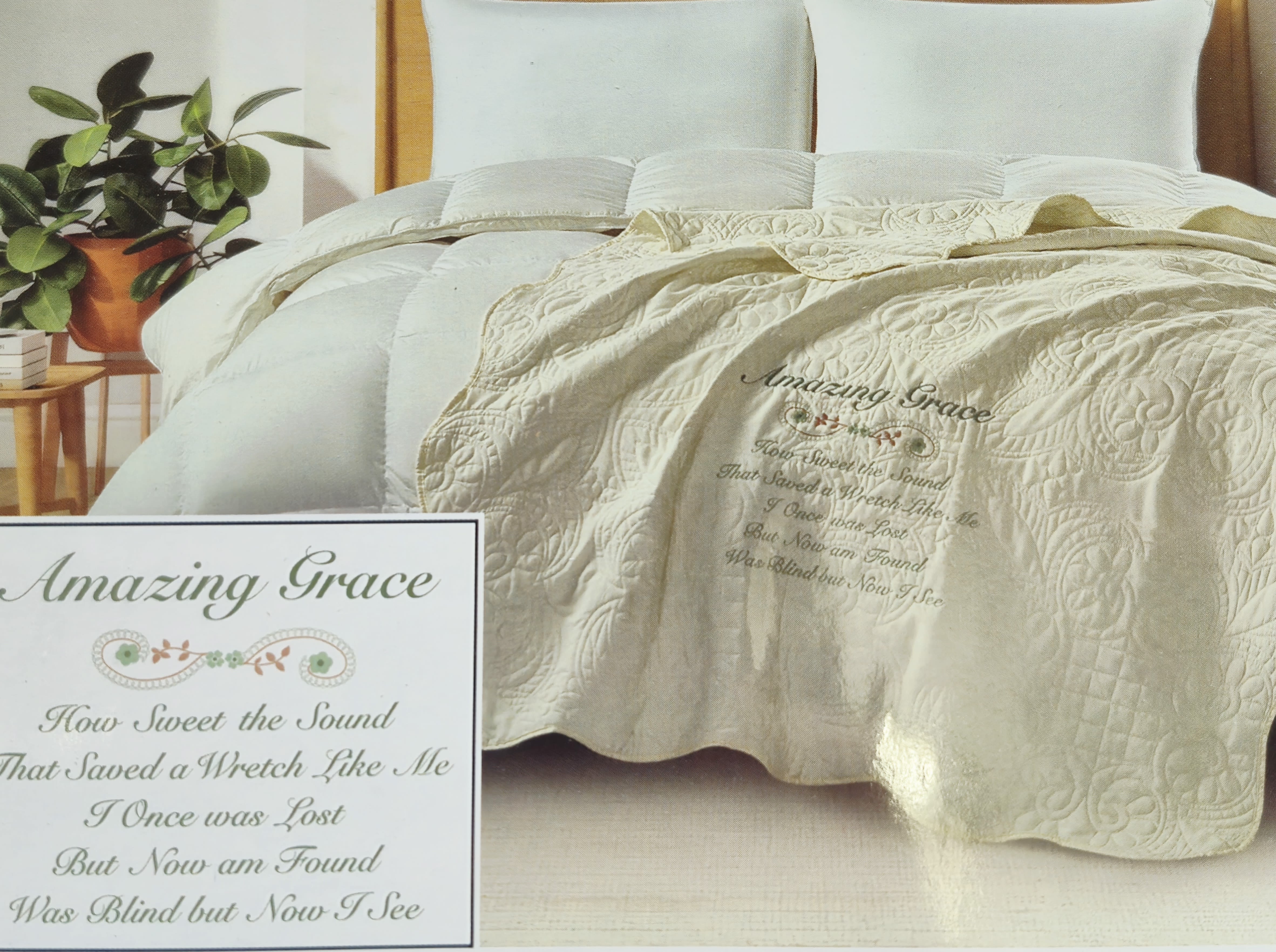 Amazing Grace Creamy White Throw  - A soft cream quilted coverlet accented with subtle embossed floral motifs sets a serene, devotional tone-perfect as a sympathy gift or a comforting housewarming present. This creamy white throw reads as peaceful and reverent, making it a thoughtful accompaniment when you want the person you're thinking of to feel gently supported and cared for.  The throw comes with a embroidered religious phrase visible on the bedding.  Give this as a comforting sympathy arrangement alternative or a faith-minded housewarming gift-the message is clear and tender. Available in the pictured size to fit a standard bed setup; gentle machine wash recommended for the quilted fabric to preserve its embossed texture and embroidery. 50 x 60  Choose Deluxe to add easel to order for presentation.