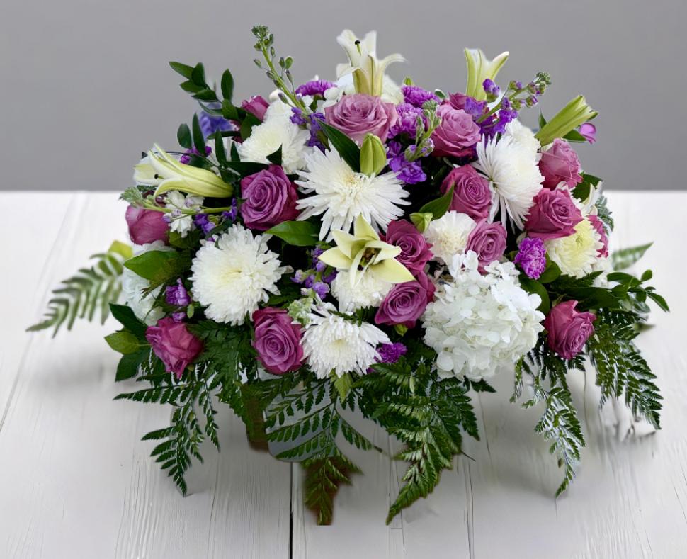 Bouquet of pink roses, white lilies, and white chrysanthemums