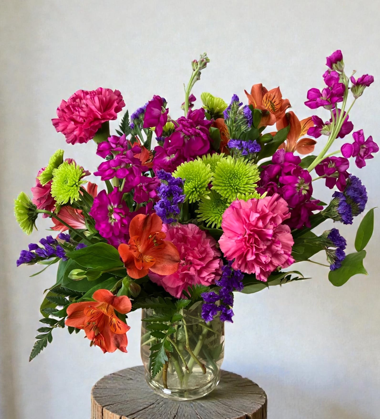 Good Vibes - Bright, cheerful color and a playful garden-style shape make this flower arrangement a perfect everyday bouquet for birthdays, congratulations, or a "just because" surprise. 