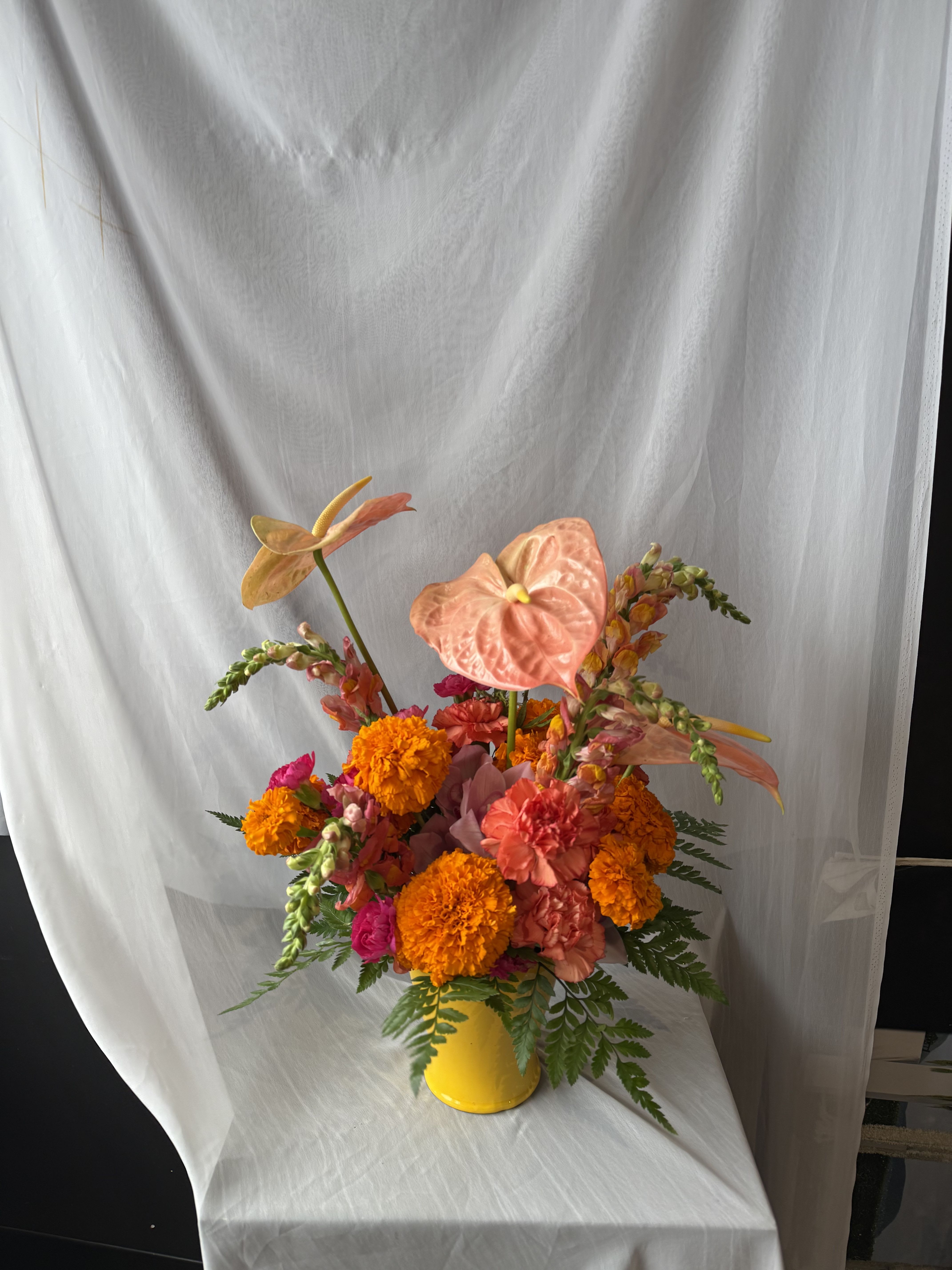 In season floral for our designers to showcase their creativity  - These are so fun for a birthday, special events, holiday, anniversary, or just to show someone you care! A special vase will be selected along with beautiful flowers to match. We have SO many fun vases, and we are excited to share them with the community! *Flower type and quantity based on market value*