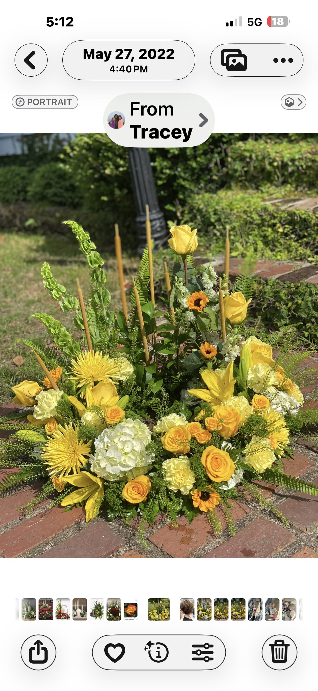 Lotwis Luxury Cremation Wreath - A magnificent, premium celebration of a beautiful life. Originally designed in loving memory of Mary Lotwis, this substantial cremation tribute is artfully arranged with striking Bells of Ireland, commanding lilies, vibrant sunflowers, textured spider mums, classic carnations, sunflowers, and premium yellow roses.   This design can be fully customized with your preferred color palette—please contact the shop directly for custom requests.